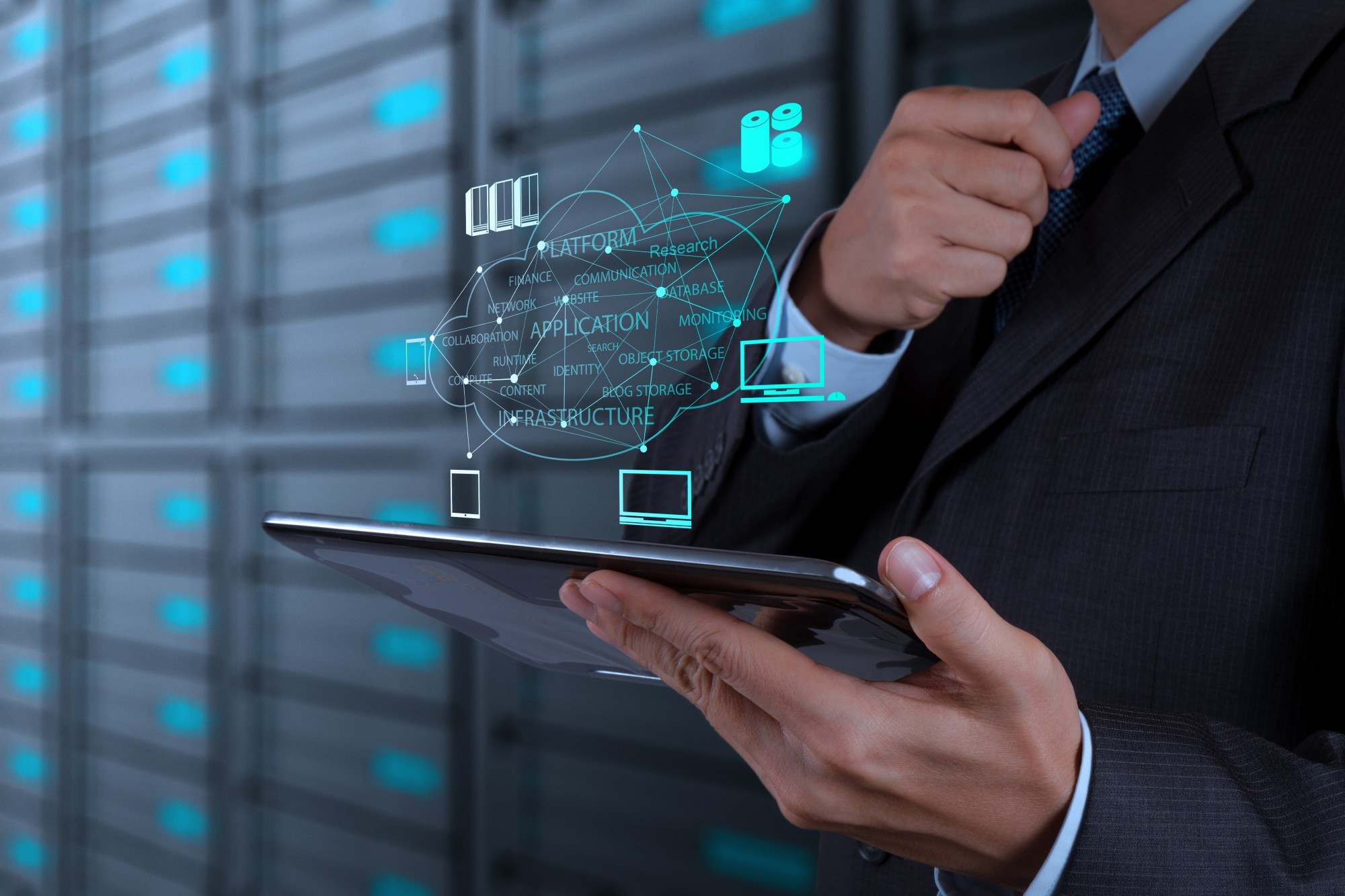 Businessman using tablet for cloud computing.