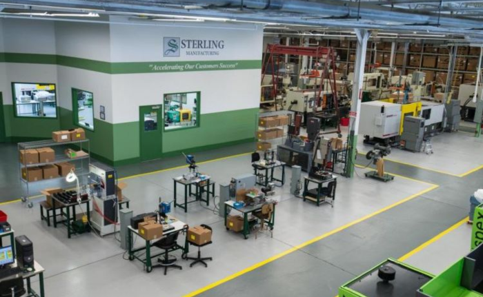 Sterling manufacturing facility with workstations and machinery.